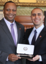 Stephens (left) being handed the key to the city by Elorza (right) for refereeing the men's NCAA championship game in 2015. Photo: City of Providence