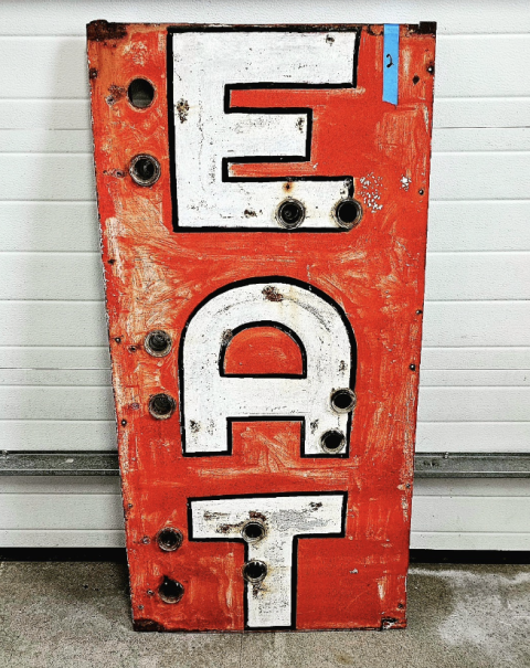 One of the original Olneyville New York System signs -- that will soon be up for auction. PHOTO: Olneyville New York System